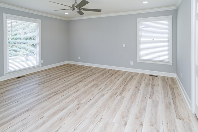 unfurnished room featuring light wood-type flooring, crown molding, and ceiling fan