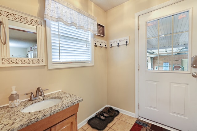 bathroom featuring vanity and tile patterned floors