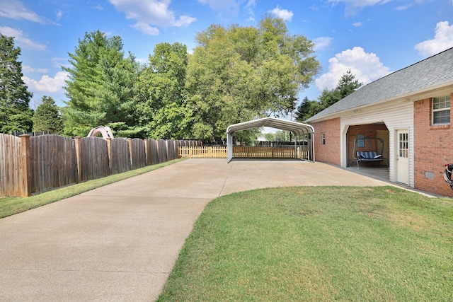 view of yard with a carport