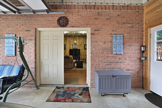 property entrance featuring a patio