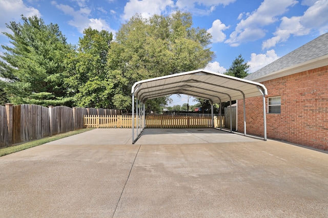 view of parking / parking lot with a carport