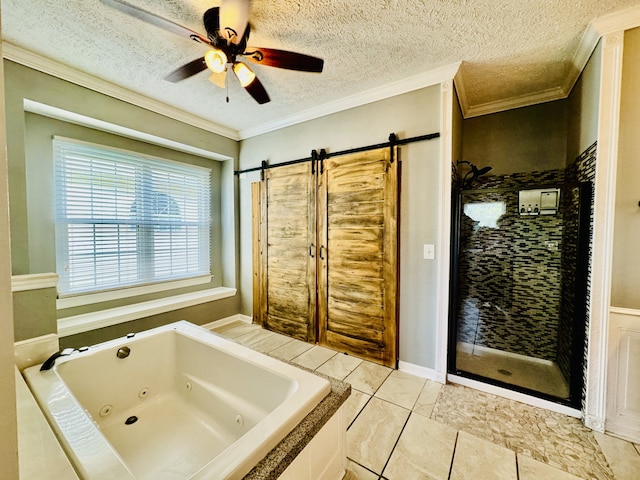 bathroom featuring a textured ceiling, crown molding, ceiling fan, and tile patterned floors