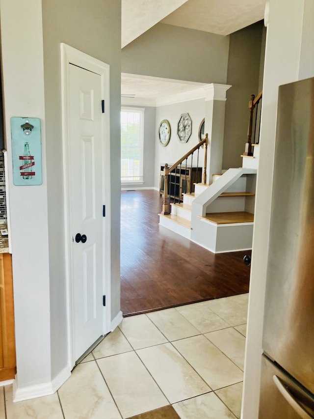 hall with light hardwood / wood-style flooring