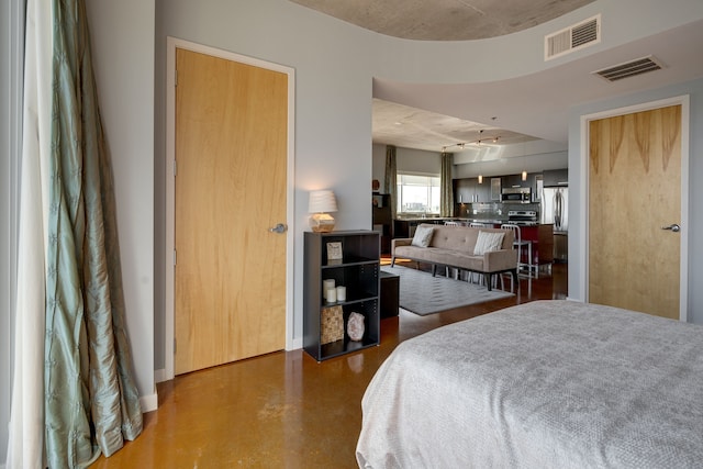 bedroom with concrete flooring