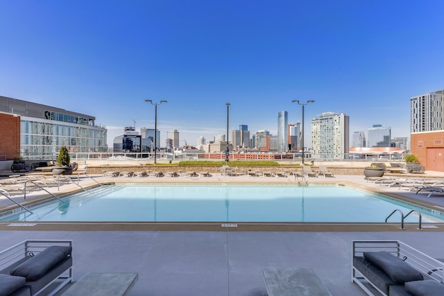 view of pool featuring a patio