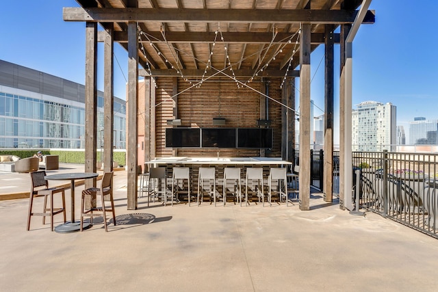 view of patio / terrace with exterior bar