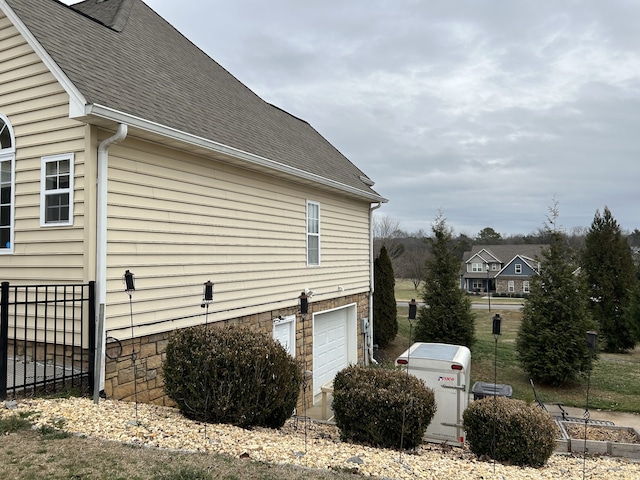 view of home's exterior with a garage