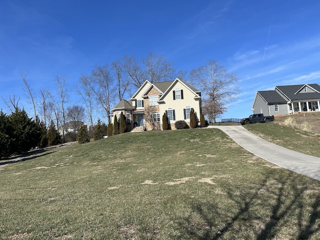 view of front of house with a front yard