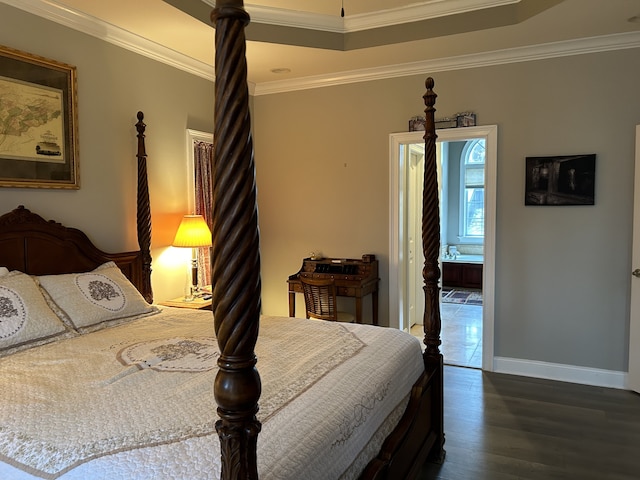 bedroom featuring dark wood-type flooring and ornamental molding