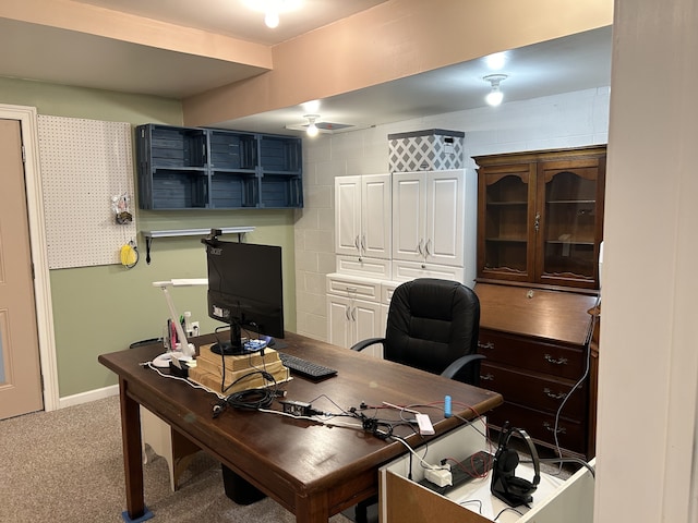 office with ceiling fan and carpet