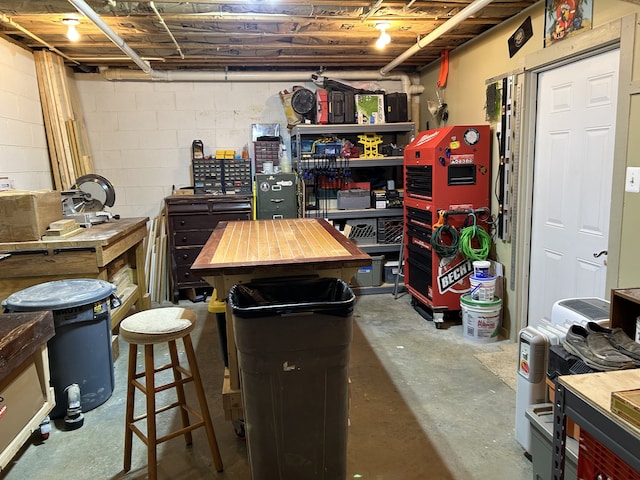 basement with a workshop area