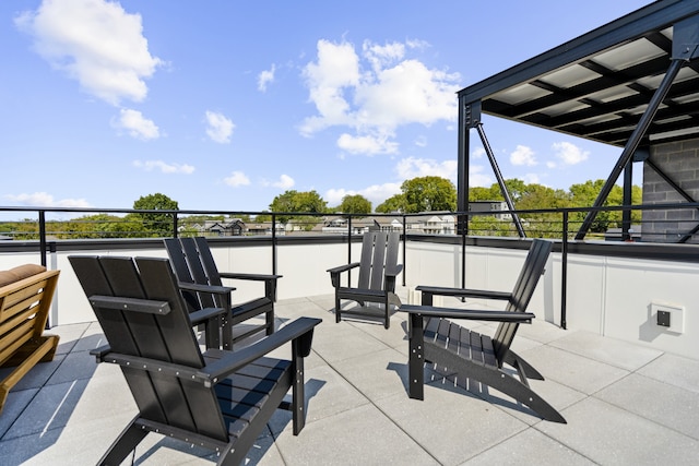 view of patio / terrace with a balcony