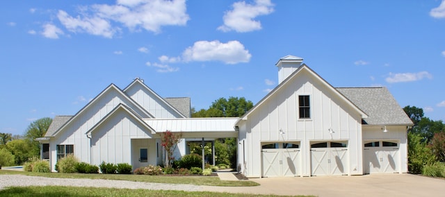 modern farmhouse style home featuring a garage