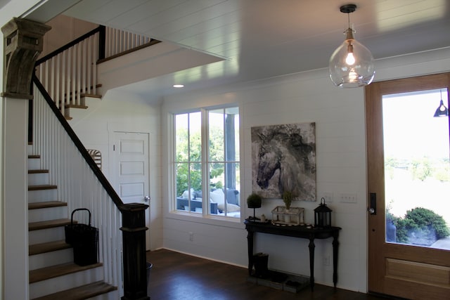 foyer entrance featuring dark hardwood / wood-style floors