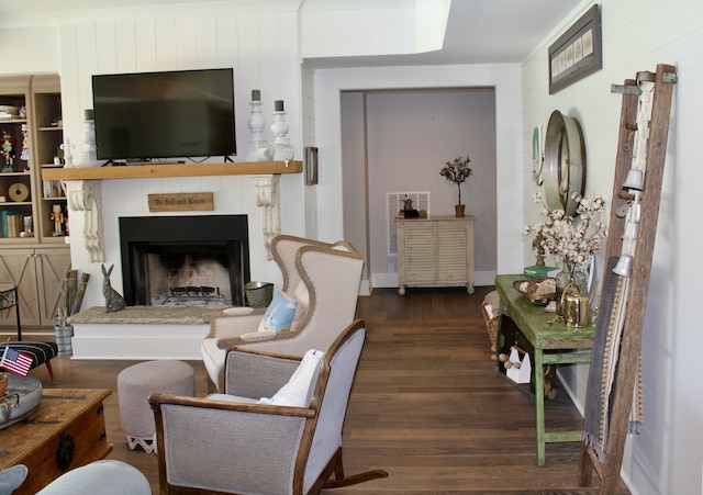 living room featuring dark hardwood / wood-style flooring