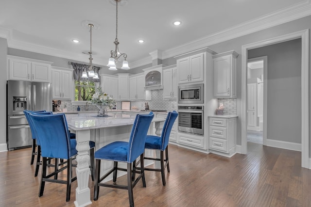 kitchen with an inviting chandelier, white cabinetry, dark hardwood / wood-style flooring, and stainless steel appliances