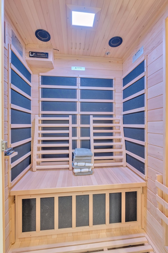 view of sauna featuring wood ceiling