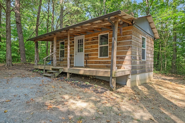 view of outbuilding with a porch