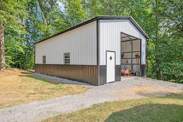 view of outdoor structure with a lawn