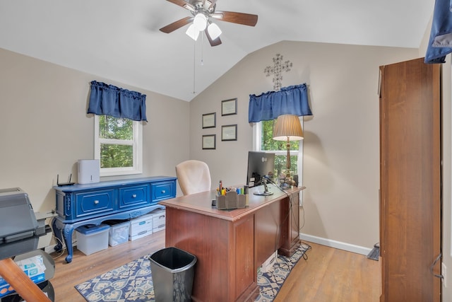 office featuring lofted ceiling, light hardwood / wood-style flooring, and ceiling fan