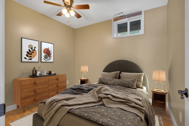 bedroom featuring light wood-type flooring and ceiling fan