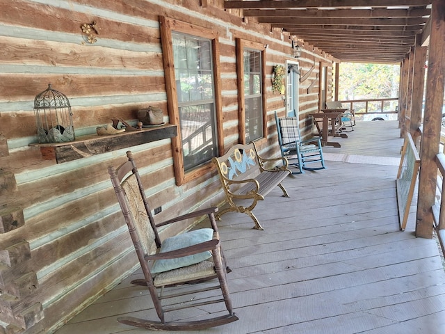 450 Pinson Ln, Big Sandy, TN 38221 - wooden terrace with covered porch