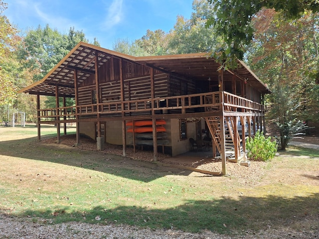 450 Pinson Ln, Big Sandy, TN 38221 - view of outbuilding featuring stairway