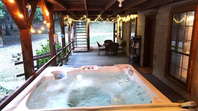 450 Pinson Ln, Big Sandy, TN 38221 - sunroom / solarium with a chandelier and a jacuzzi