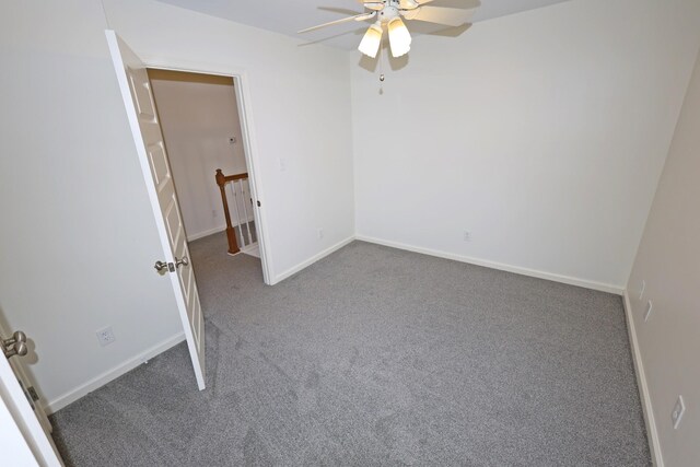 unfurnished bedroom featuring carpet flooring and ceiling fan