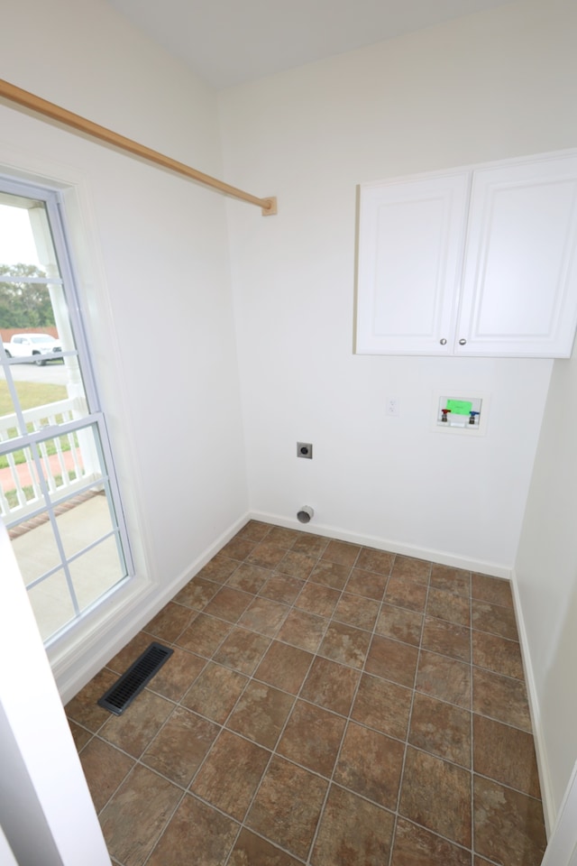 laundry room with washer hookup and electric dryer hookup