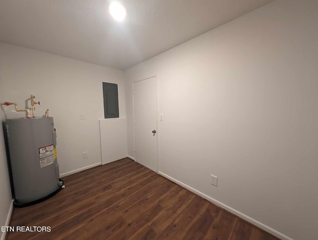 utility room with electric panel and electric water heater