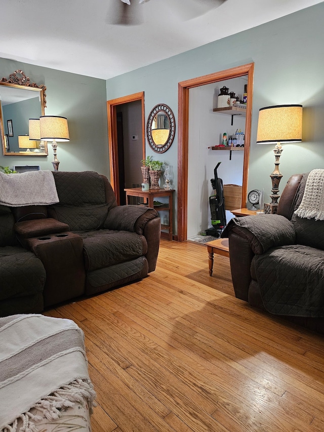 living room with light hardwood / wood-style flooring