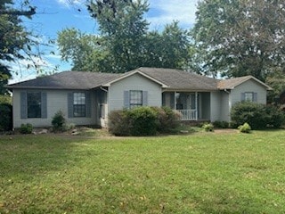 ranch-style house with a front yard