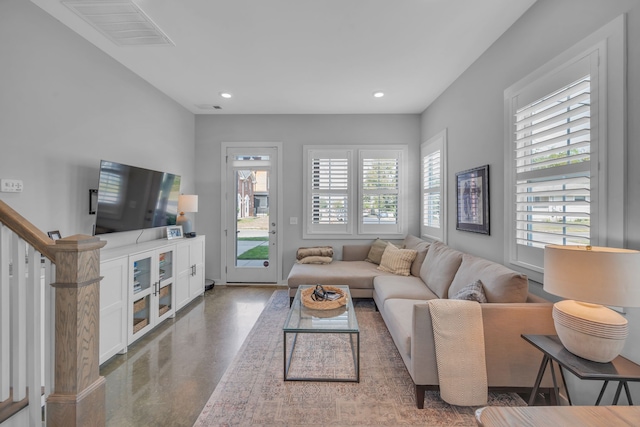 living room with concrete floors