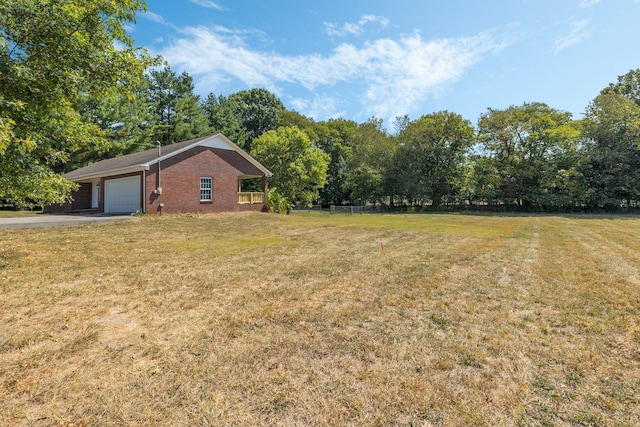 view of yard with a garage