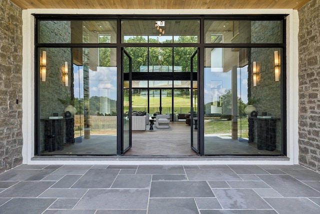 doorway to property with a patio