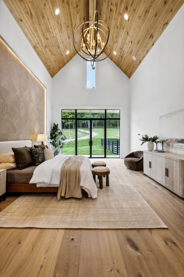 bedroom with wooden ceiling, high vaulted ceiling, and wood-type flooring