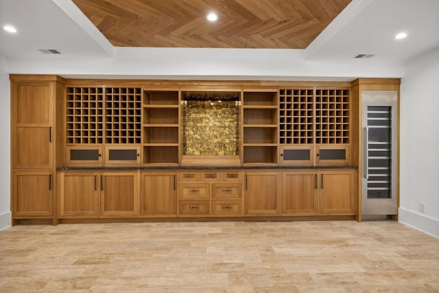 wine room featuring wooden ceiling