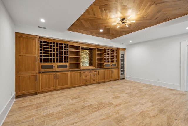 interior space featuring wooden ceiling and a notable chandelier