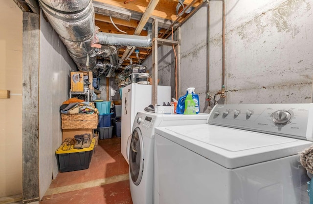 washroom featuring laundry area and independent washer and dryer