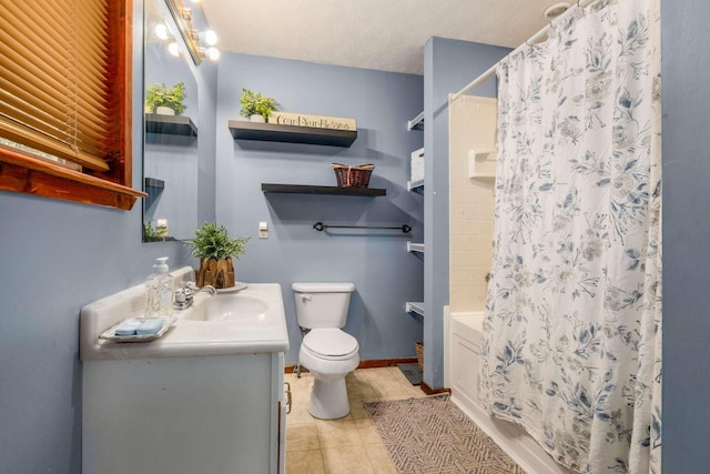 bathroom featuring toilet, shower / bath combo, vanity, baseboards, and tile patterned floors