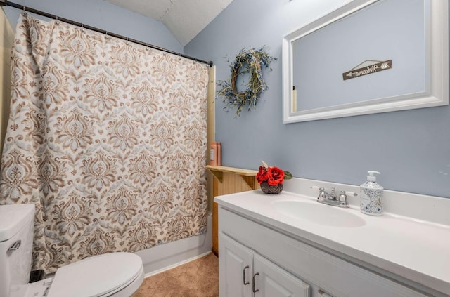 full bath featuring toilet, lofted ceiling, a textured ceiling, and vanity