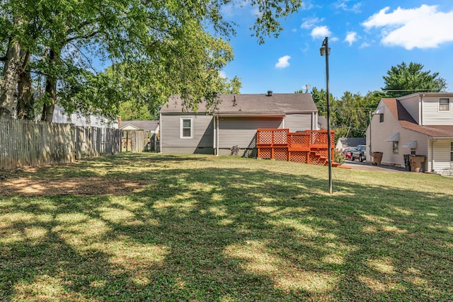 view of yard with a deck