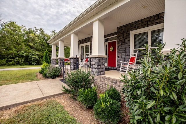 property entrance featuring covered porch