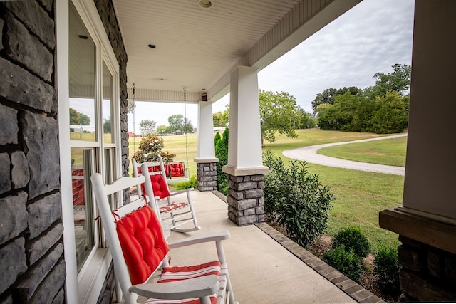 view of patio featuring a porch