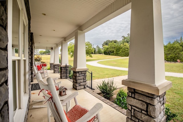 view of patio featuring a porch