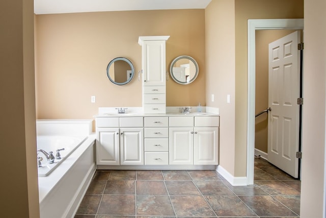 bathroom featuring vanity and a bathing tub