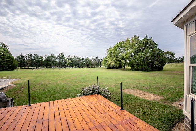 deck featuring a yard