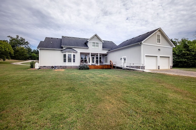 view of front facade featuring a front yard and a garage