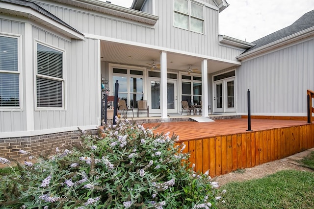 exterior space with ceiling fan